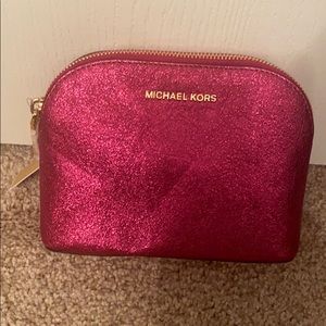 MK hot pink metallic travel pouch